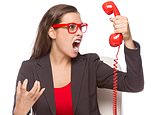 End the rip-off phone lines that charge callers for waiting on hold 