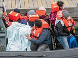 Migrants forced onto rafts of dinghies TAPED together as smugglers ship more people across channel