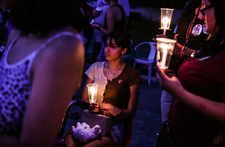 Families and friends remember the victims at the first funerals