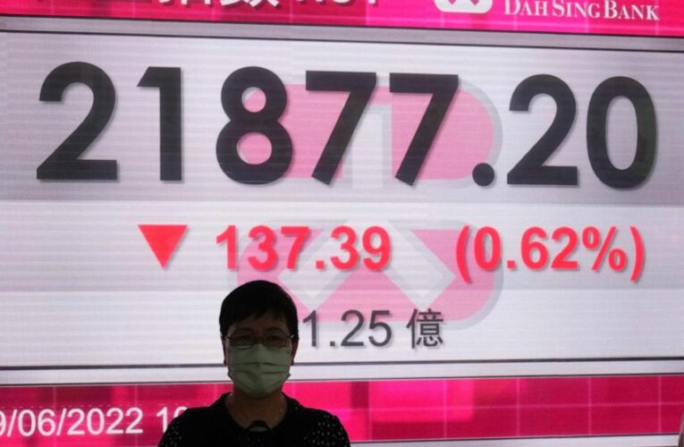 Asian shares fall as oil lingers above $120, yen sinks