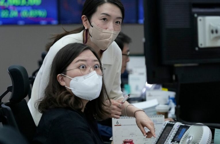 Asia shares slide across board amid rate hike, COVID worries