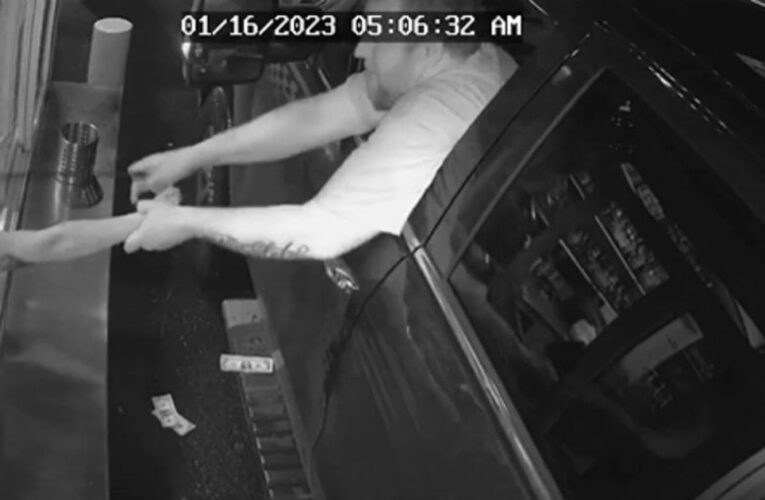 Man tries to kidnap a barista through a drive thru window.